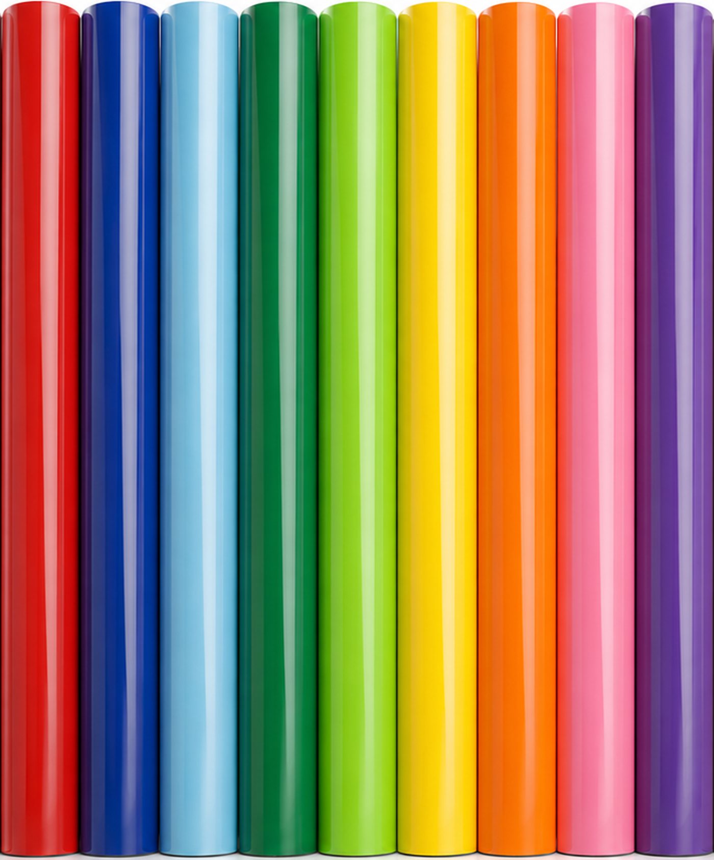 Rouleaux de vinyle adhésif de découpe en neuf couleurs vives, du rouge au violet, alignés côte à côte